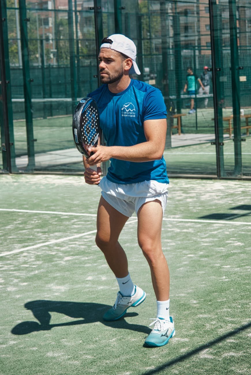 a padel player holding a padel racket